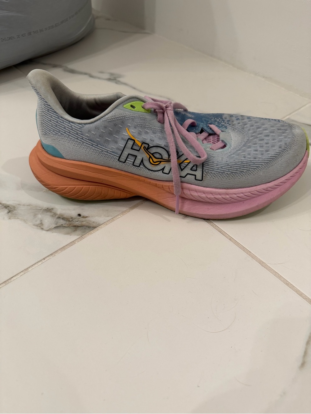 Hoka Grey Shoe with Pink and Orange Accents